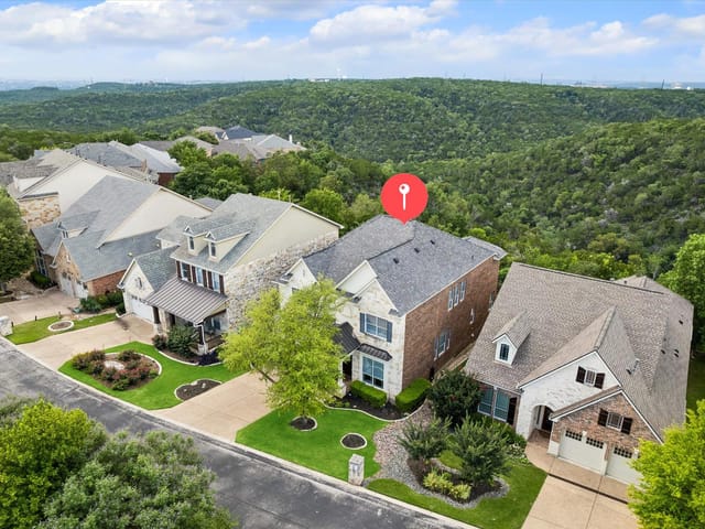 View 6214 River Place BLVD in River Place Sec 25 Amd Of Lts 6214 River Place BLVD - front exterior - Luxury home in River Place Sec 25 Amd Of Lts, Austin, TX