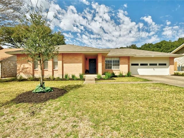 6703 Rustling Oaks Trl