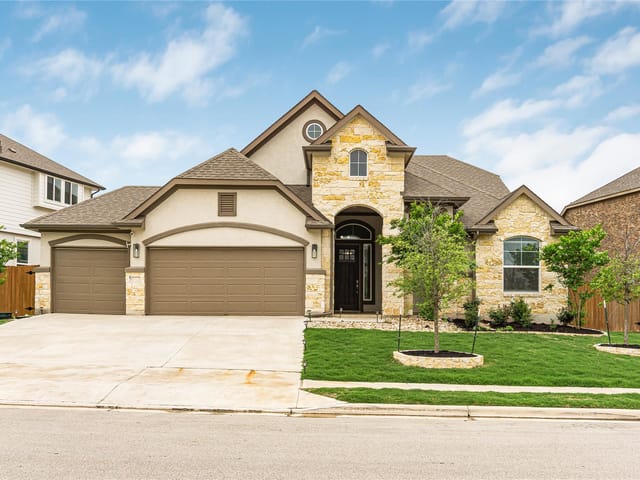 View 6721 Empresa DR in Sweetwater Ranch Sec 1 Village L P 6721 Empresa DR - front exterior - Luxury home in Sweetwater Ranch Sec 1 Village L P, Austin, TX