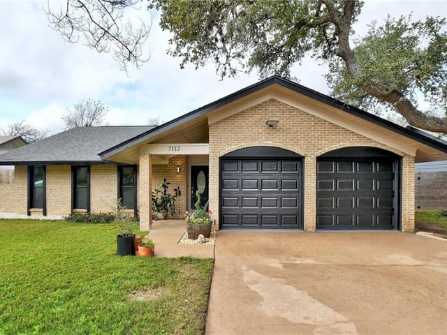 7112 Twisted Oaks Dr