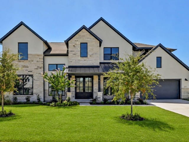 View 7425 Desert Needle DR 7425 Desert Needle DR - property photo 1 - Luxury home in Lago Vista, TX