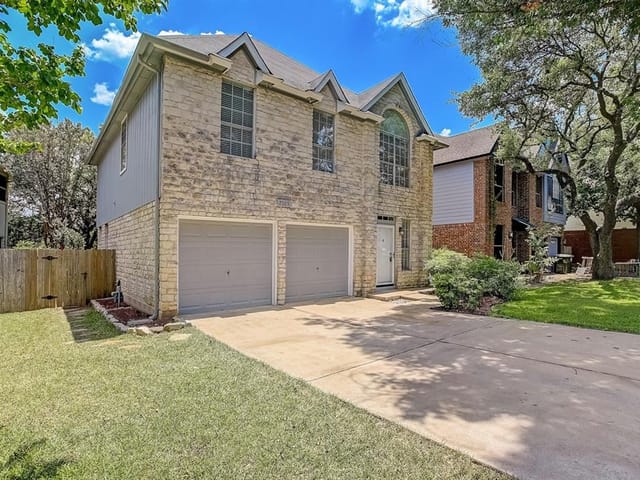7509 Windrush Dr