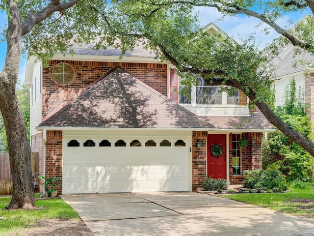 7523 Windrush Dr