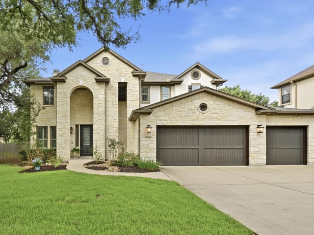 View 7721 Haggans LN in Circle C Golf Estates Ph 02 7721 Haggans LN - front exterior - Luxury home in Circle C Golf Estates Ph 02, Austin, TX