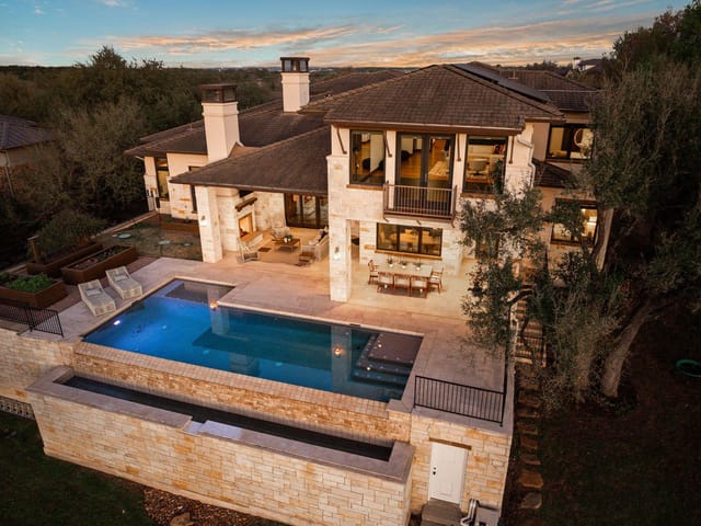 View 7724 Lynchburg DR in Belvedere Ph 01 7724 Lynchburg DR - front exterior - Luxury home in Belvedere Ph 01, Austin, TX
