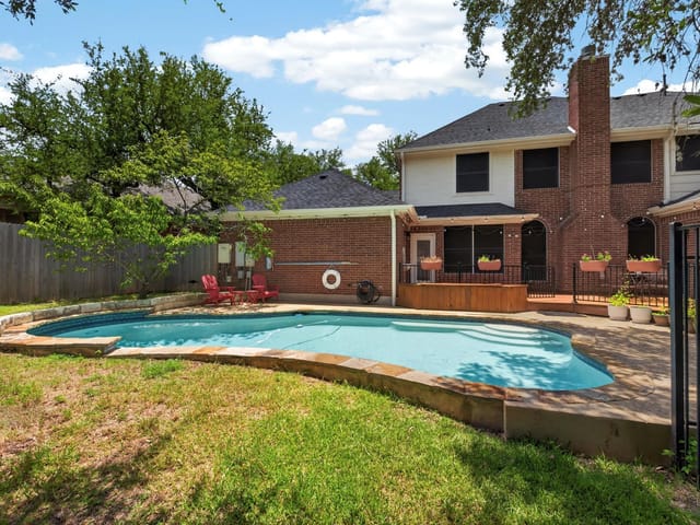 View 7804 Blue Lilly DR in Great Hills 23 7804 Blue Lilly DR - front exterior - Luxury home in Great Hills 23, Austin, TX