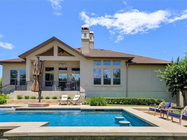 View 802 Crestone Stream DR in Serene Hills Sub Ph 2e 802 Crestone Stream DR - front exterior - Luxury home in Serene Hills Sub Ph 2e, Lakeway, TX