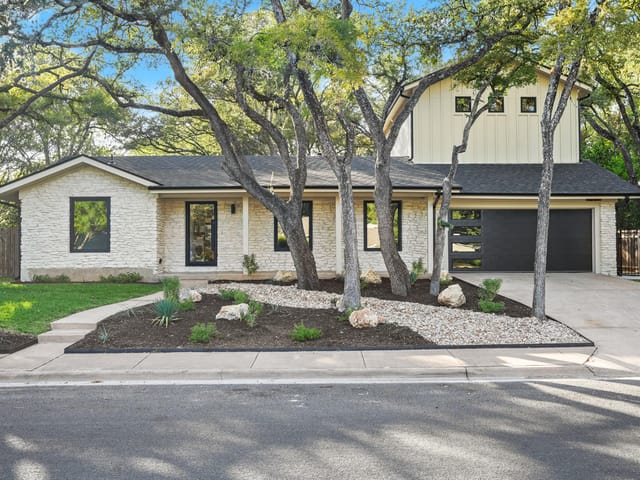 View 8100 Greenslope DR 8100 Greenslope DR - property photo 1 - Luxury home in Austin, TX