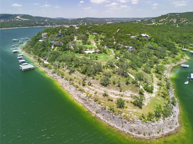View 8101 Sharon RD 8101 Sharon RD - property photo 1 - Luxury home in Volente, TX