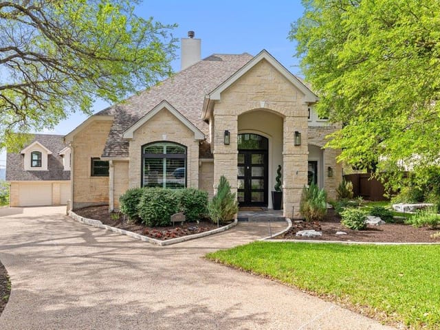 9905 Charthouse Cv - front exterior - Luxury home in River Place Sec 07B, Austin, TX